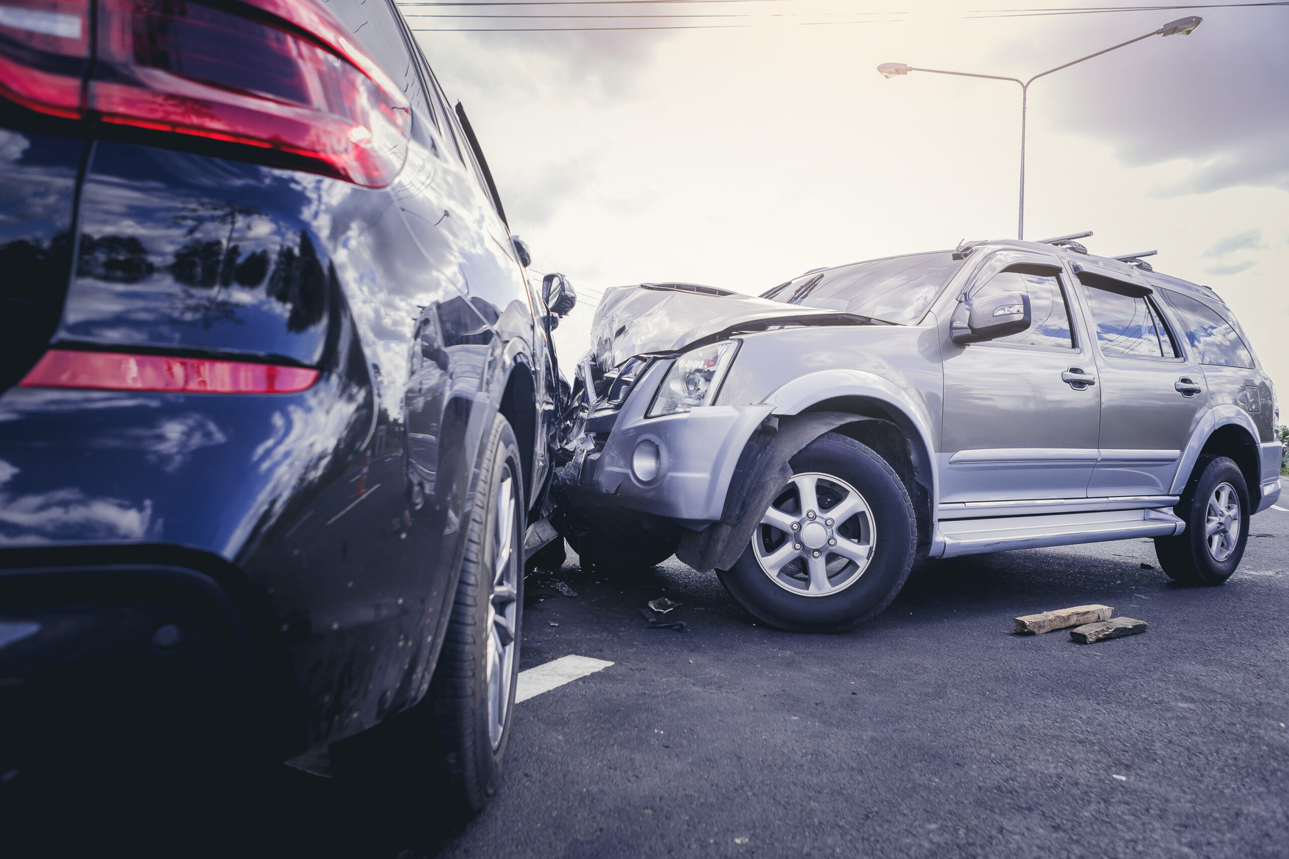 Auto insurance agent reviewing a Massachusetts car insurance policy with a Raynham driver